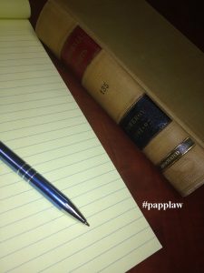 Legal Pad, pen and law book